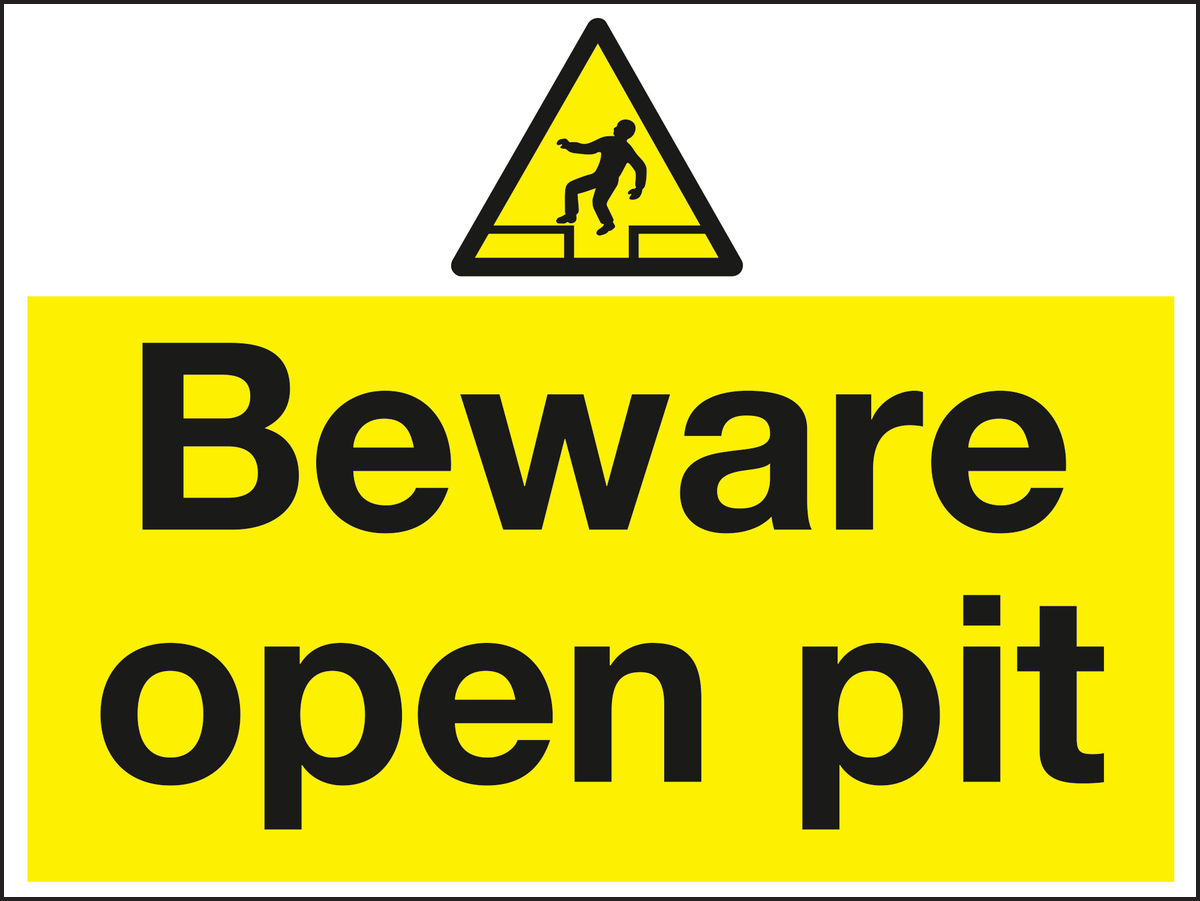 Beware open pit sign