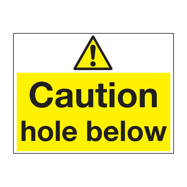 Caution hole below sign Caution hole below sign