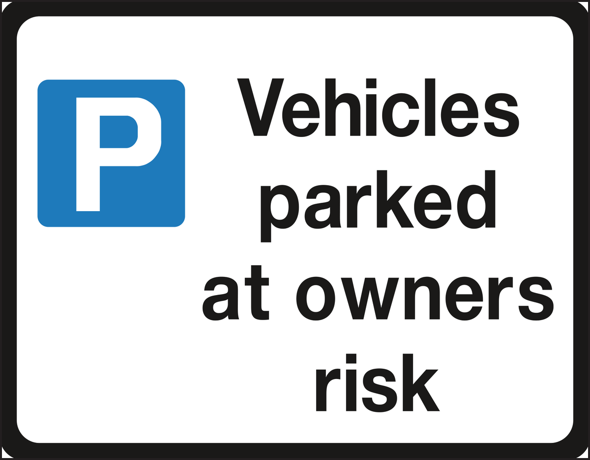 Vehicles parked at owners risk sign